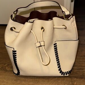 Cream with black stitching bucket bag